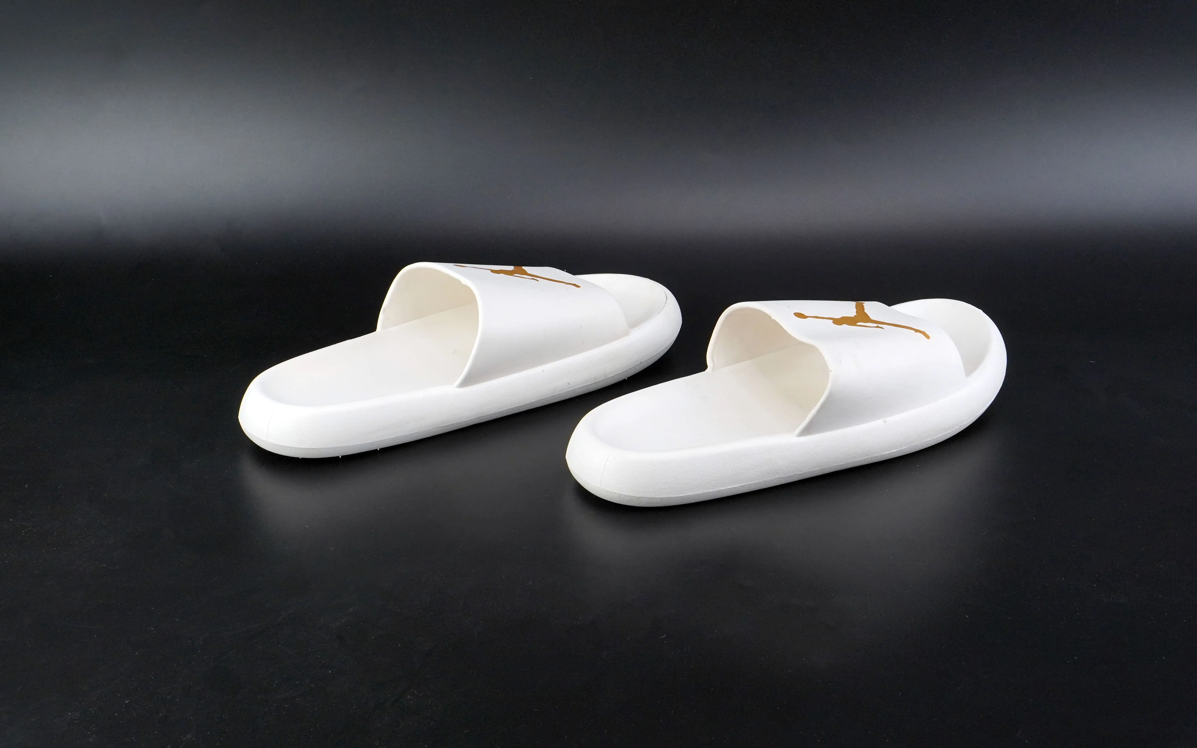 White Jordan slides for men in golden logo