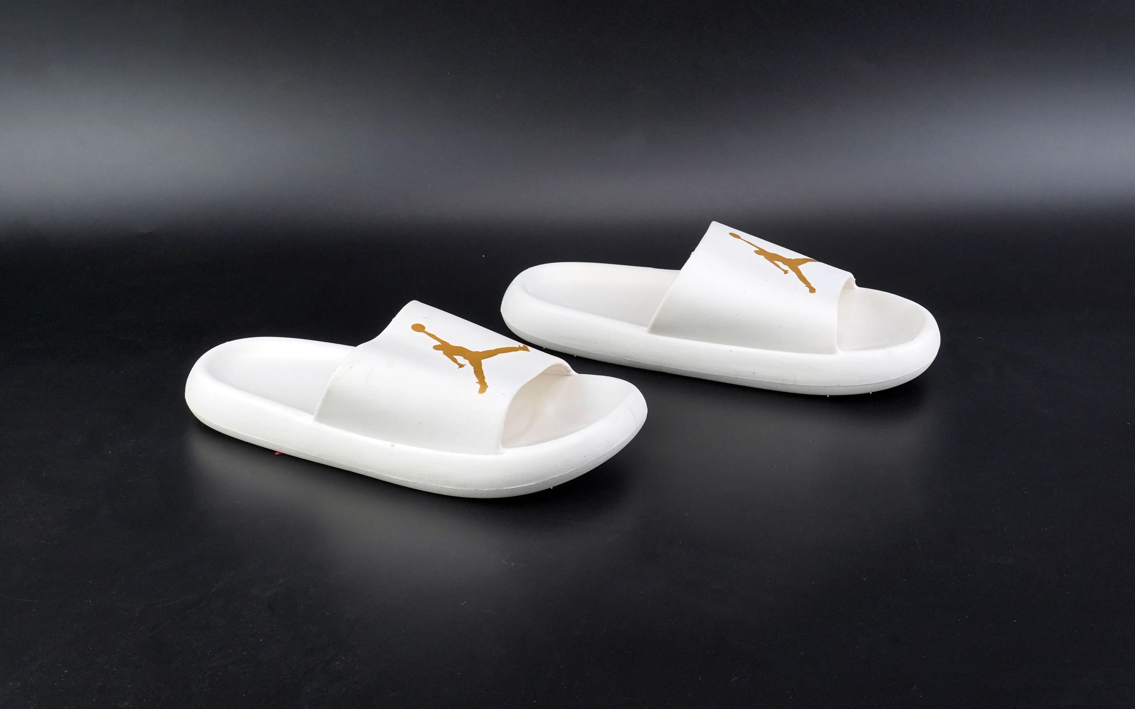 White Jordan slides for men in golden logo